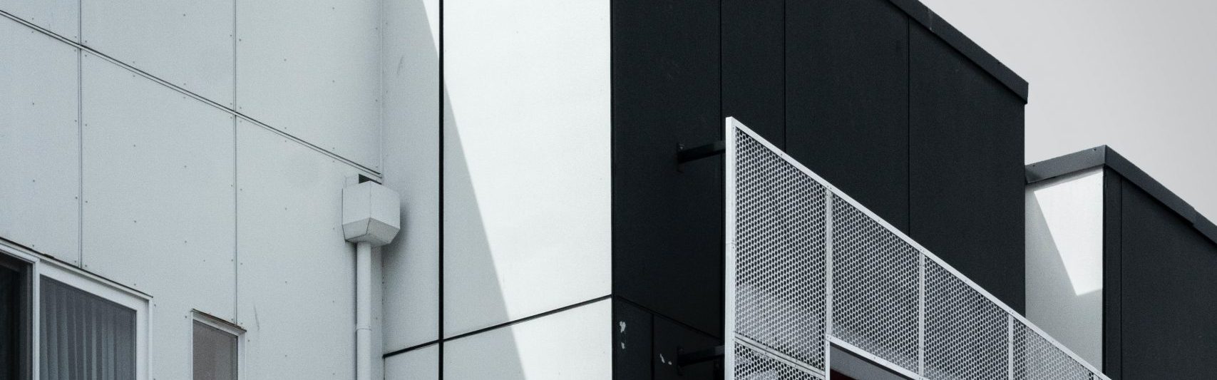 matt-reames-g_qTxJEj1AY-unsplash-scaled Black and white building