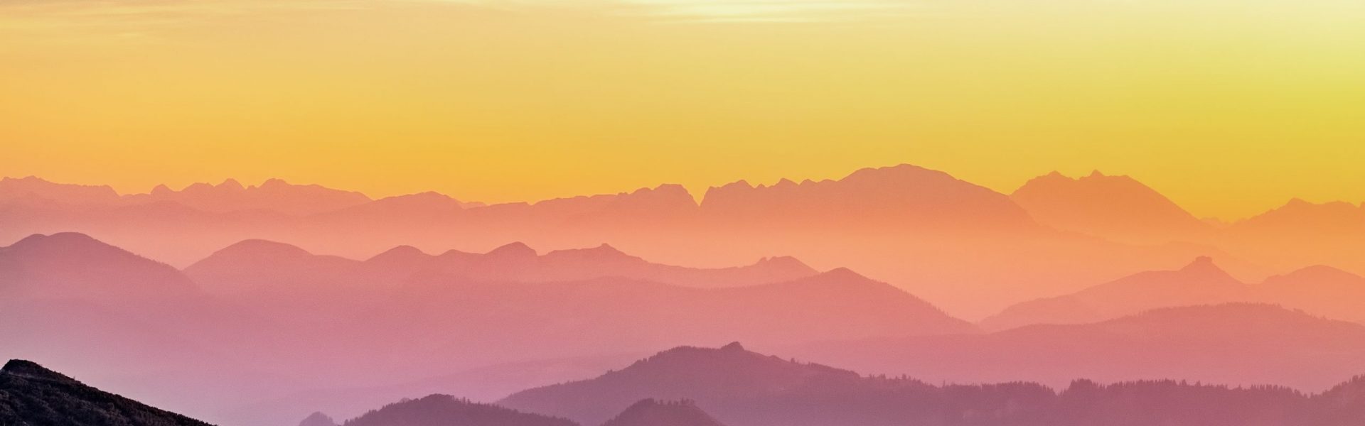 simon-berger-twukN12EN7c-unsplash-scaled rainbow colored sunset over misty mountains